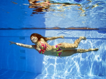 Triathlete Ryoko Jones at Nightcliff pool during underwater photo shoot. Ryoko is a leading athlete in Darwin