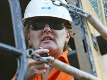 Safety equipment - communicating at Ranger Uranium Mine. aul truck driver - female