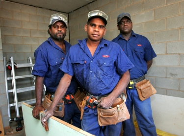 Aboriginal construction crew works on a house at Amoonguna, east of Alice Springs. L to R: Cedric Ross, Harry McCormack & Warren Schaber. Photographer: David Hancock. Copyright: SkyScans.