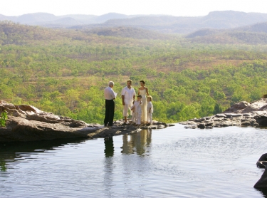 The wedding of Tanya and Craig at Gunlom in Kakadu National Park, northern Australia. outdoors wedding tropical marriage ceremony waterhole outback 567867 Photographer: David Hancock. Copyright: SkyScans