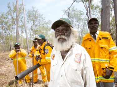 Warddeken Indigenous Protected Area covers 1,394,951 hectares of spectacular stone and gorge country on the western Arnhem Land plateau, in northern Australia. The area adjoins Kakadu NP. Fire management - rangers using rakes and leaf blowers