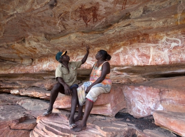 The Warrdeken Indigenous Protected Area, east of kakadu NP, is a large area that has been incorporated into the National Reserve Systme of parks and reserves. It is managed by local Aboriginal people who have responsibility for looking after the area, which is rich in fauna and flora and aboriginal cultural sites. Victor Garlngarr and wife Barbara Gurwalwal at a rock art site at Victor's home country at Ngalkombarli, in Arnhem Land.