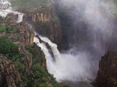 Kakadu National Park in the Top End of northern Australia is one of the world's Heritage areas and a popular destination for tourists from all over the world. Arnhem Land escarpment in the wet season - Twin Falls