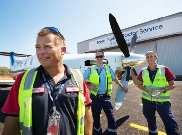 The Royal Flying Doctor Service (RFDS) in Broome. Operations base, aircraft and staff working with patients in Broome and a medical clinic at Yakanarra near the Fitzroy River. RFDS staf: Doctor Edi Albert, nurse Jo Smallshaw and pilot Ed Tonkin (blue shirt) stand in front of a RFDS Pilatus PC-12 aircraft at the Broome base.